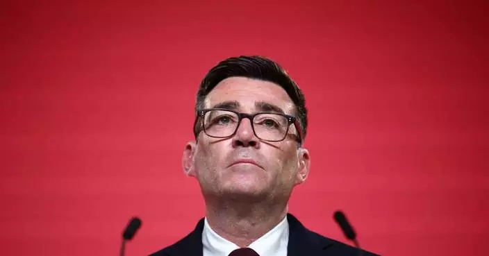 The Latest: Andy Burnham becomes seventh British prime minister in a decade