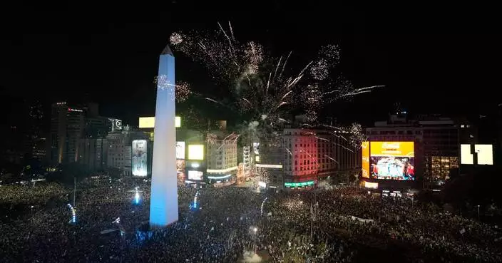 Tens of thousands of Argentine soccer fans celebrate their team's World Cup semifinal victory