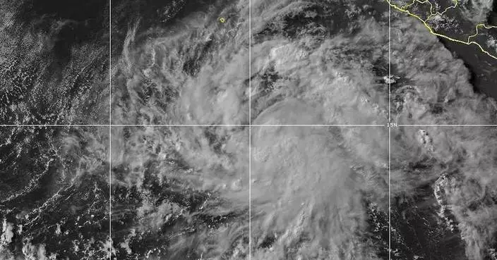 Tropical Storm Elida forms in the Pacific Ocean and poses no threat to land as it strengthens