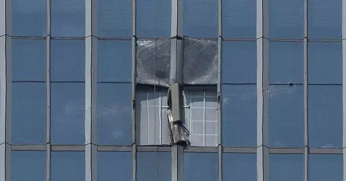 Pilot who hit Beijing's tallest building wrote about 'ending his life,' Chinese authorities say