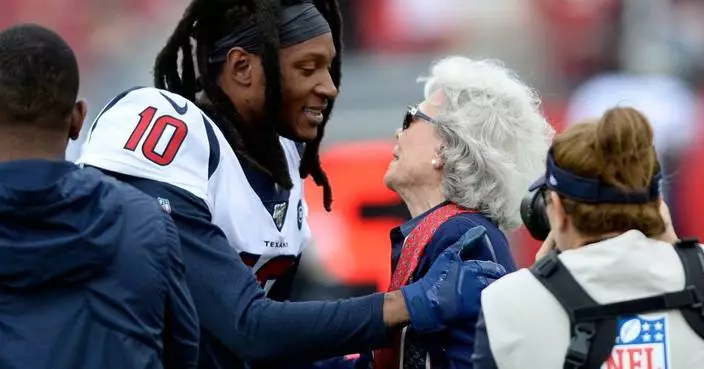 DeAndre Hopkins is with the Patriots at training camp, shadowing coaches and other staff
