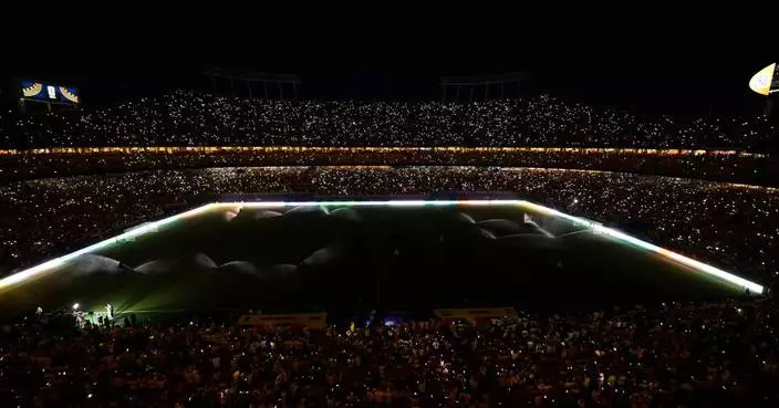 One Extraordinary Photo: A stadium lit up by smartphones