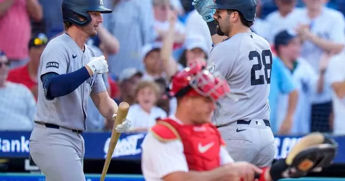 Wells and Domínguez homer to lead New York Yankees past Philadelphia Phillies  3-1