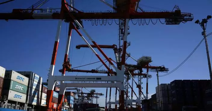 Survey shows Japan's business sentiment improving for a 5th straight quarter