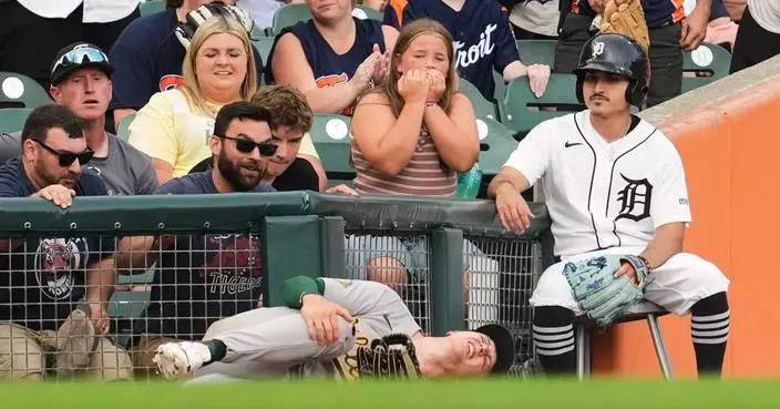 Athletics’ Zack Gelof exits early with apparent knee injury after colliding with left field fence