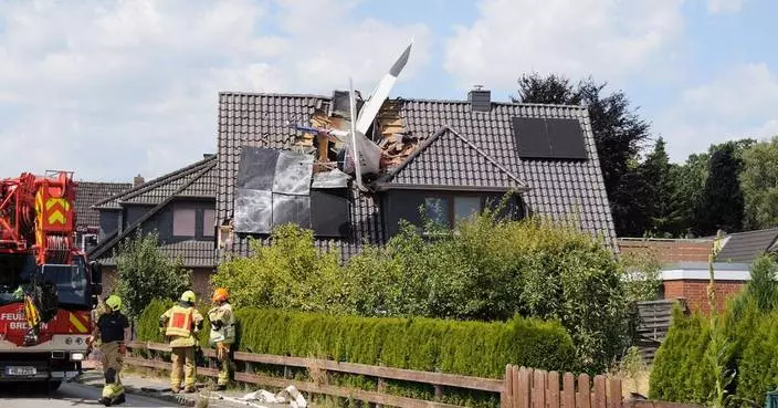 Small plane crashes into a home in northern Germany, leaving 1 dead and 1 missing