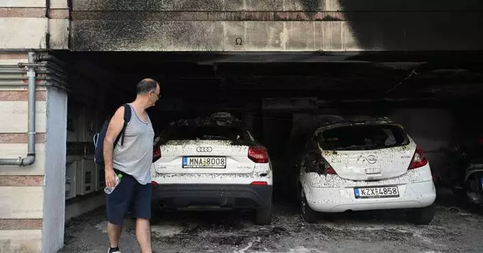 Greek anti-terrorist police arrest 3 for bomb attack that killed politician's mother, injured 4
