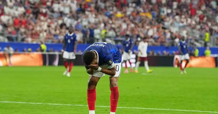 One Extraordinary Photo:  France's Kylian Mbappe shows his frustration against Spain