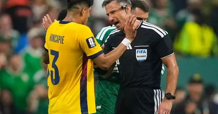 Why are World Cup refs giving red cards to players covering their mouths when confronting opponents?