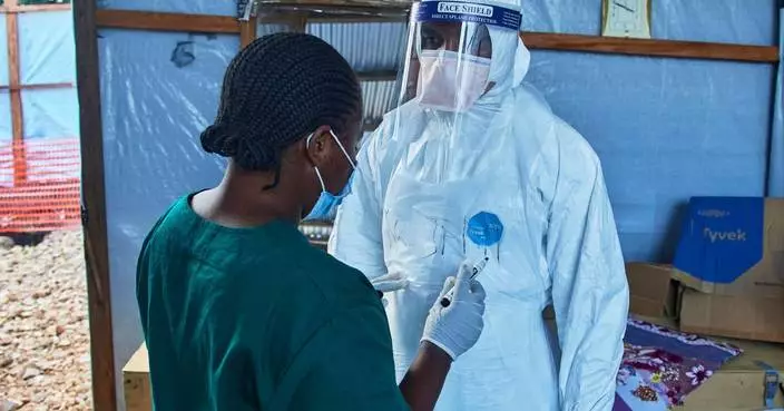 Residents in eastern Congo cling to hope as a new Ebola treatment trial begins