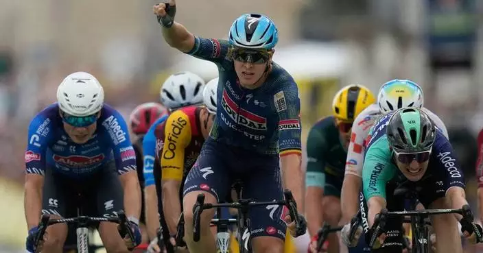 Merlier wins crash-marred 12th stage of the Tour de France, Pogacar retains overall lead