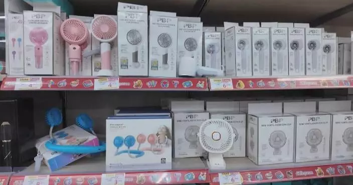 Chinese cooling products in hot demand amid sweltering heat in Madrid