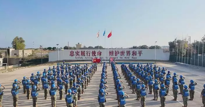 Chinese peacekeepers in Lebanon hold flag-raising ceremony to mark CPC's 105th founding anniversary