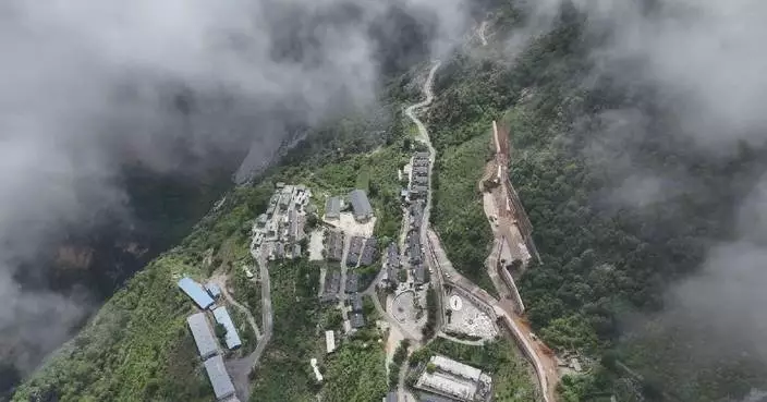 Young village official dedicated to transforming once-roadless village