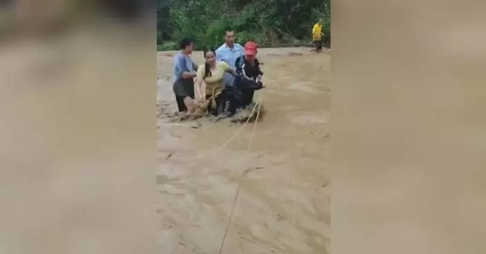 Rescuers brave heavy rain to evacuate flood-stranded residents in Guangxi, Inner Mongolia