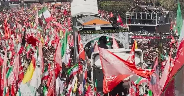Iranians pay respects, vow to continue Khamenei's mission at massive funeral procession