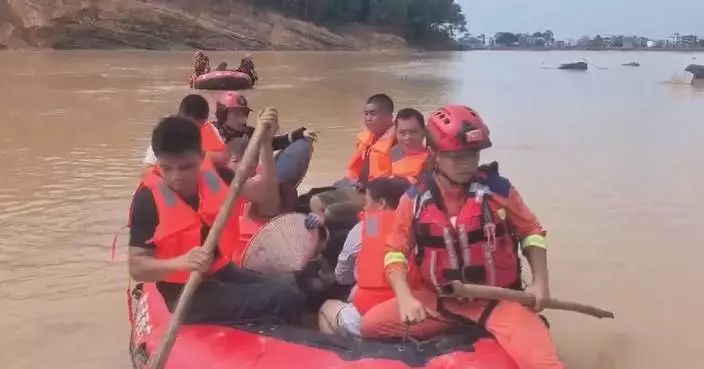 Race against time in Guangxi to rescue flood-hit residents, restore roads