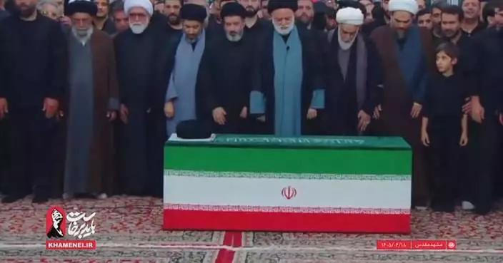Khamenei's three sons show up at his burial ceremony