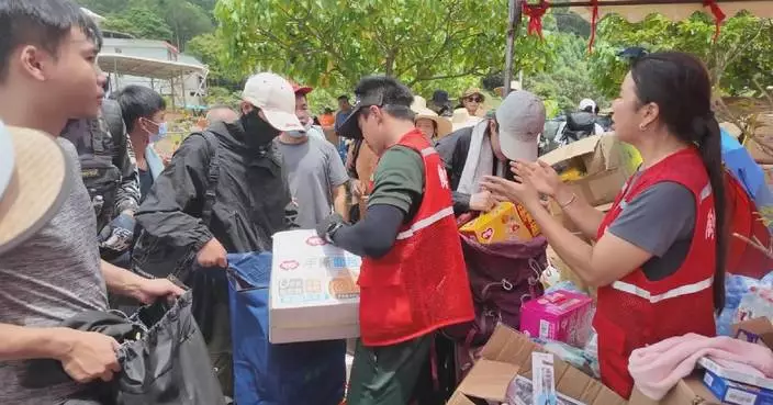 Rescue teams rush to isolated Guangxi town after devastating floods