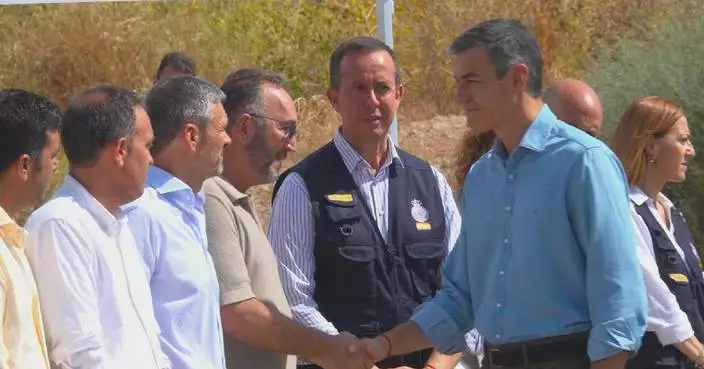 Spain's prime minister visits wildfire site as death toll reaches 13