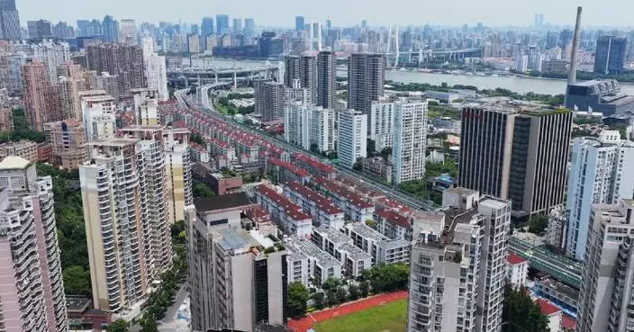 Xi visits residential community which benefited from urban renewal initiative in Shanghai