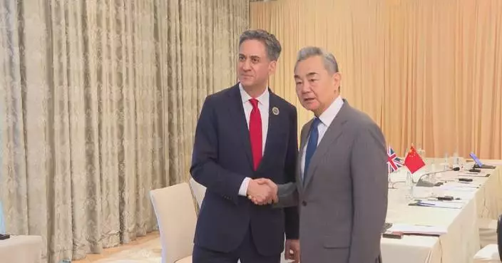 Chinese FM urges Britain to avoid imposing security implications on economic, trade issues