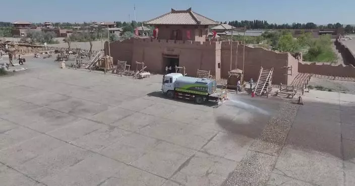 Scenic spots in northwest China's Dunhuang act to beat summer heat as temperatures soar