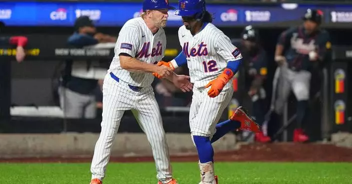 Francisco Lindor homers twice and drives in 6 as Mets pull away for 14-3 rout of Braves