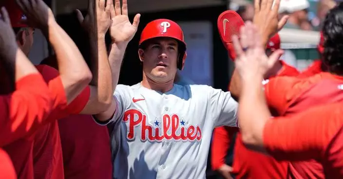 Realmuto's 3-run double and Wheeler's strong pitching help Phillies beat Tigers 5-0 to win series