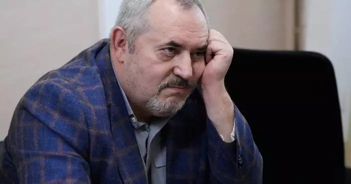 A Putin critic is convicted on charges that will keep him from campaigning for Russia's parliament