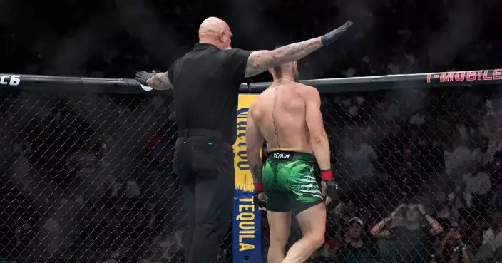 McGregor outlines plan for surgery, rehab and another fight following knee injury against Holloway