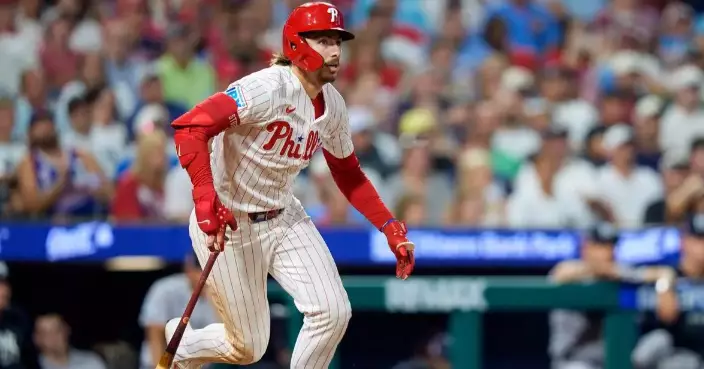 Bryson Stott homers and drives in 5 as Phillies rout Yankees 11-4 to avoid series sweep