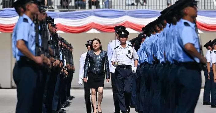 Miss Rosanna Law Inspects Passing-Out Parade for New Police Officers at Hong Kong Police College
