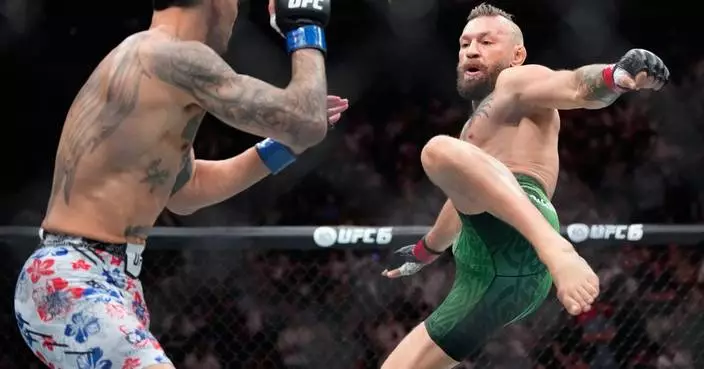 Conor McGregor suffers early knee injury in return, loses to Max Holloway at UFC 329