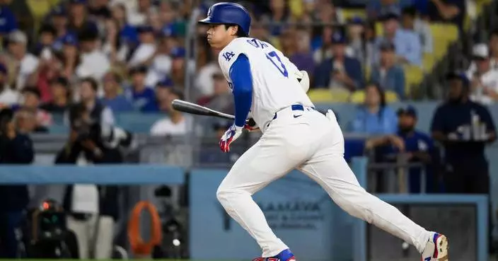 Rushing delivers a dramatic 11th-inning walk-off as Dodgers edge Rockies 8-7