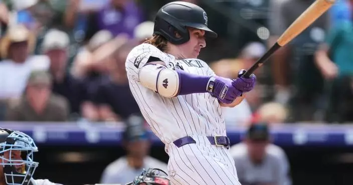Rockies erupt for 14-4 win over the Marlins, fueled by a 7-run sixth