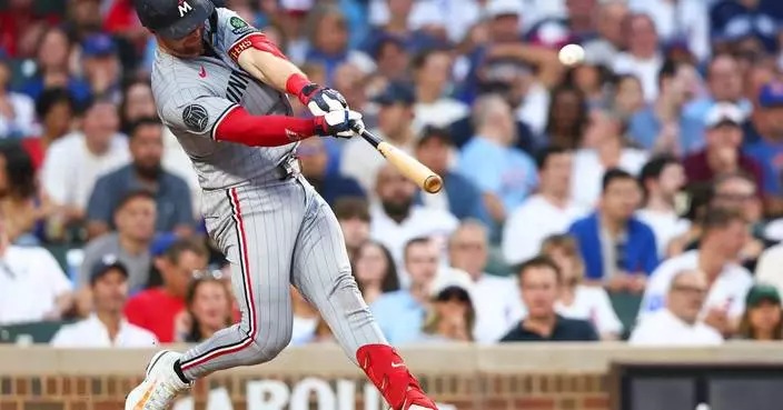 Jeffers hits 3-run HR to back Ober in the Twins' 5-2 win over the Cubs
