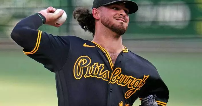 NL East-leading Braves break up Pirates' combined perfect-game bid in the 7th on Albies' single