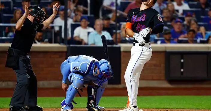 Jared Young hit by a pitch with the bases loaded, ignites a 5-run eighth as Mets beat Royals 6-2