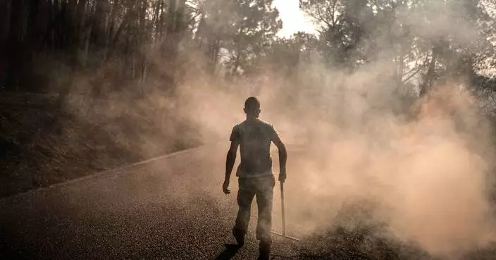The Latest: Fire crews in southwest France battle massive blaze as they face extreme temperatures