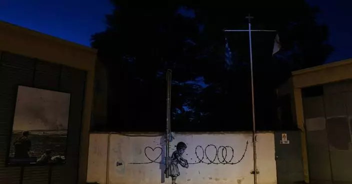 A wall through Nicosia reflects the decades-old ethnic divide in Cyprus, in photos