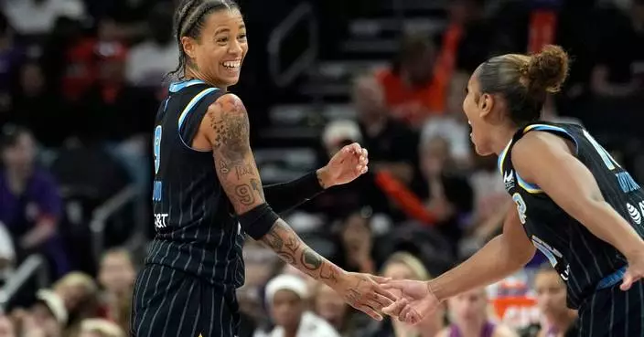 Sydney Taylor scores 10 of her 16 points in the 3rd quarter and the Sky beat the Mercury 77-66