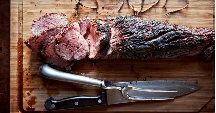 This smoky, fire-kissed beef tenderloin with herb butter comes from Canal House