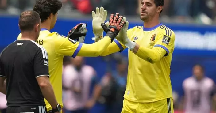 Injured Belgium goalkeeper Thibaut Courtois leaves World Cup quarterfinal loss to Spain