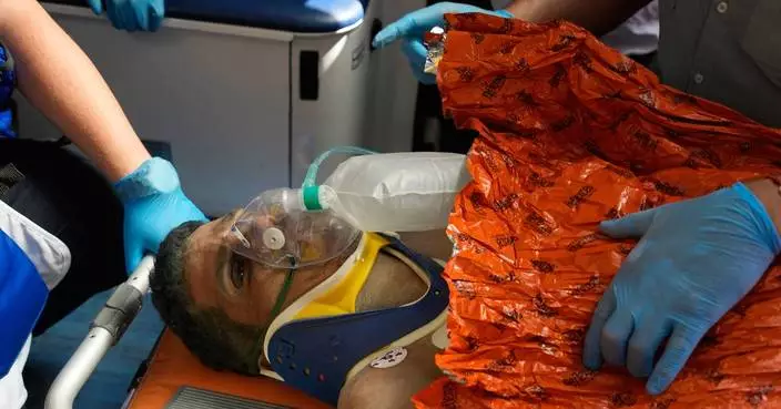 Venezuelan security guard pulled alive from building basement 8 days after twin quakes