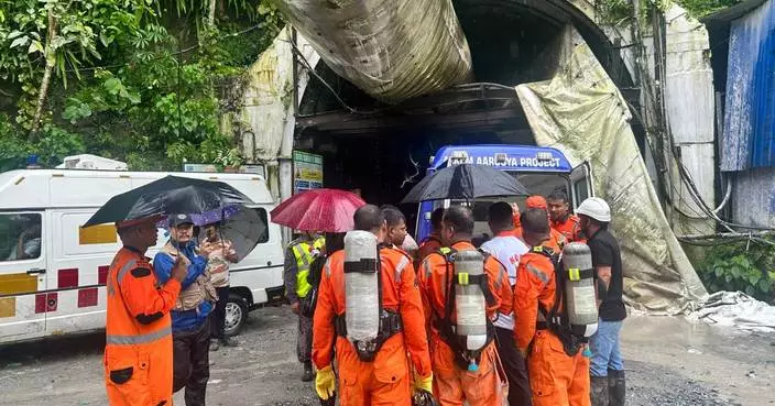 Toxic gas slows efforts to rescue 13 workers trapped in India hydropower tunnel