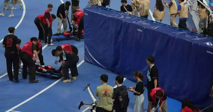 A Chinese humanoid robot sets a new 100-meter sprint record at Beijing Games