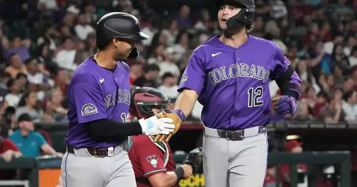 Karros hits 2-run homer before leaving after collision, Rockies rally past Diamondbacks for 3-2 win
