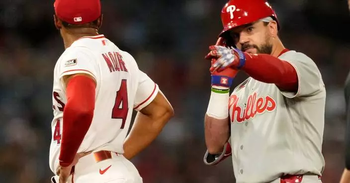 Sanchez sharp, Schwarber, Turner have 10th-inning hits in Phillies' 4-2 win over Angels