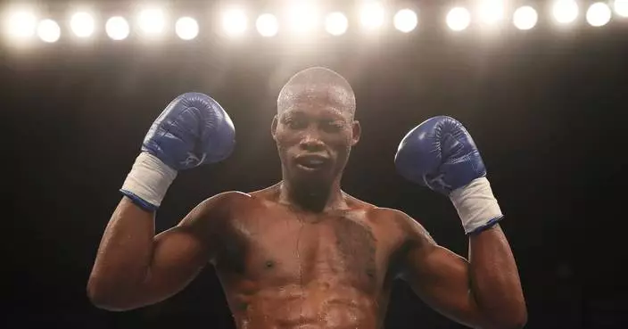 South African police arrest 4 in the killing of former champion boxer Zolani Tete